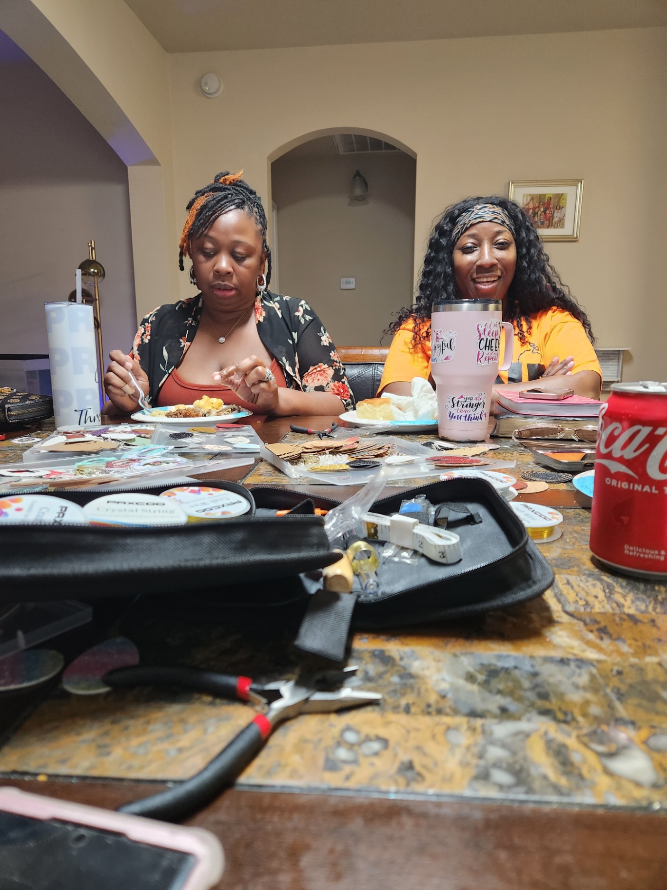 Crafting and catching up at the table.